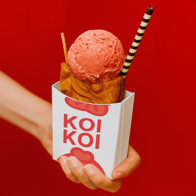 Sphère Becreat Graphiste Vincennes Deux sphères stylisées se chevauchent sur un fond gris, créant un jeu d'ombres.